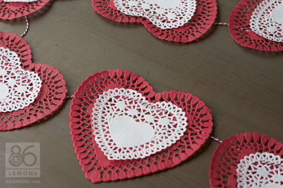 Easy Valentine Garland using paper lace hearts from the dollar bin at Target  86lemons.com 