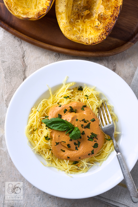 Baked Spaghetti Squash with Creamy Roasted Red Pepper Sauce  #vegan #glutenfree #foodphotography  86lemons.com