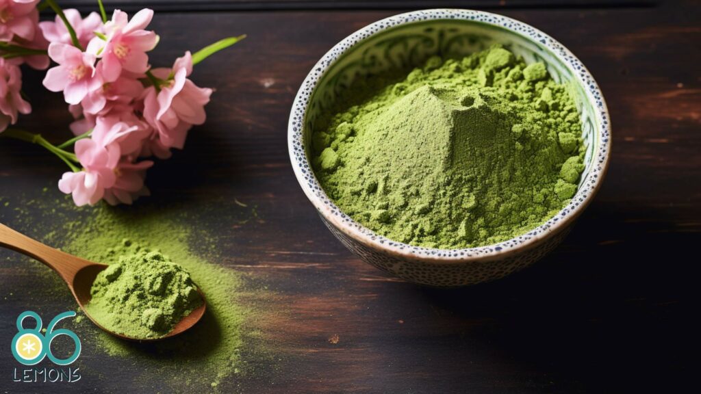 matcha powder with a spoon on a rustic table